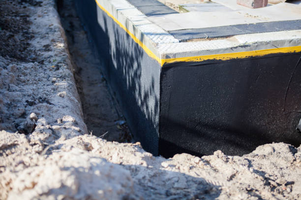 Professional Exterior Waterproofing technician working in Sheboygan Falls, WI